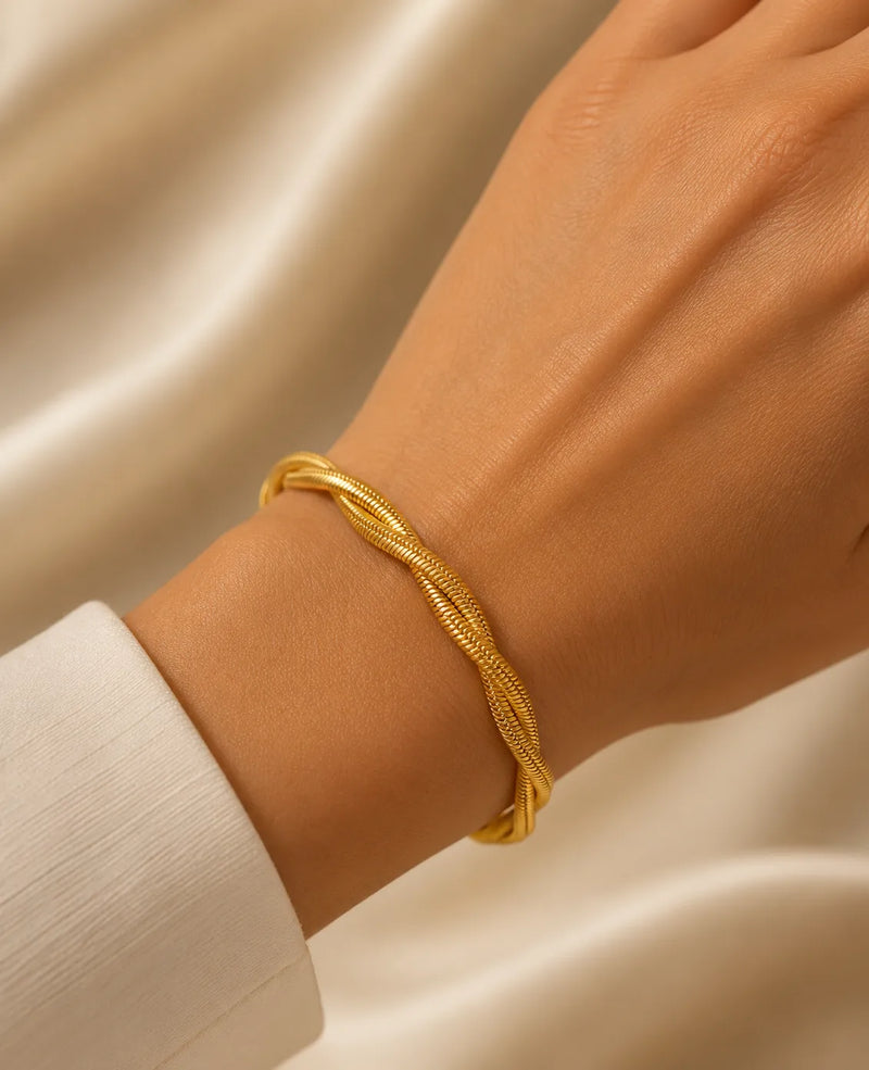 Bracciale Intrecciamo in acciaio Gold