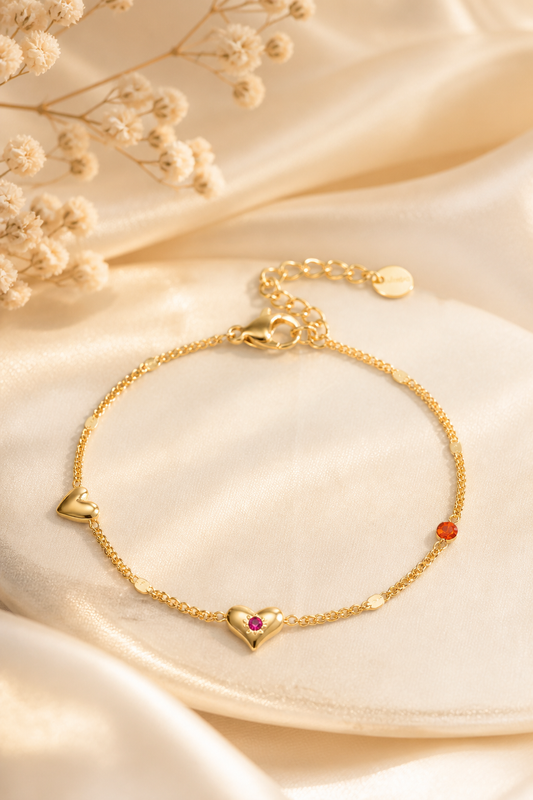 bracciale con motivo a cuore e pietra