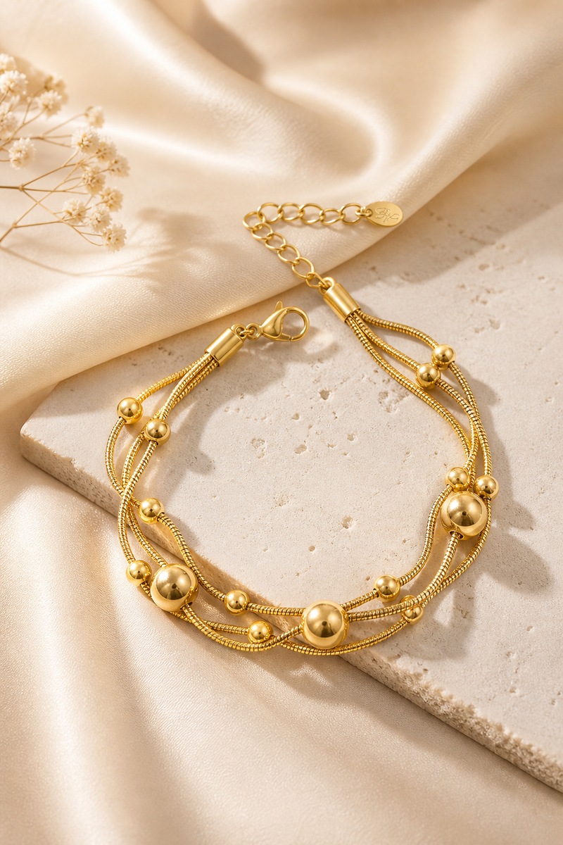 Bracciale con catene e pois