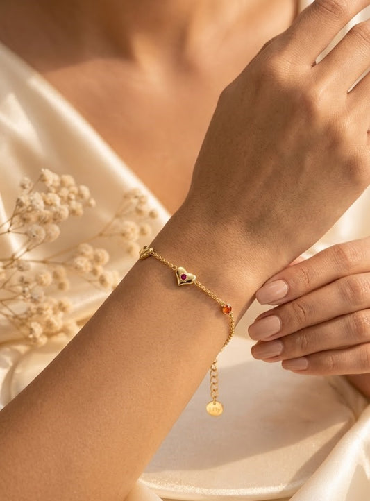 bracciale con motivo a cuore e pietra